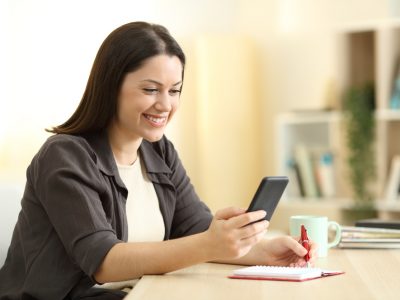 woman checking her phone.